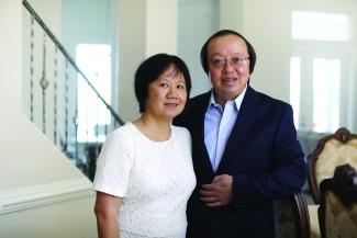 Photo of Dr. Bing Zhang and his wife, Rachel, inside their home.